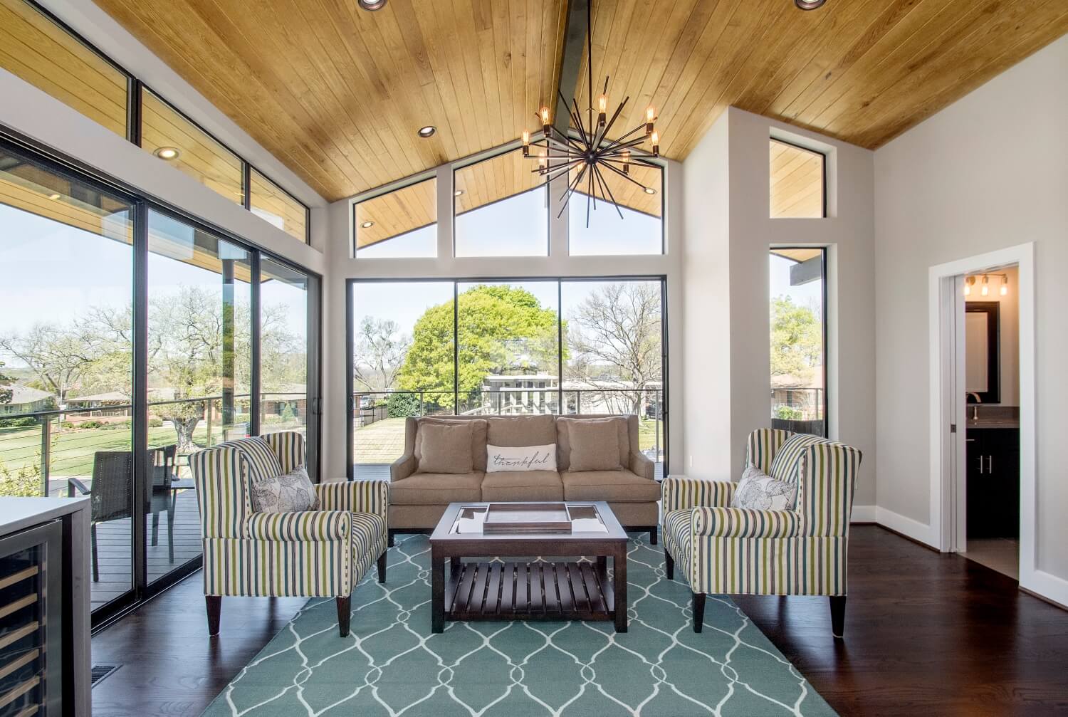 Sunroom Windows That Maximize Light Year-Round Interior of a modern sunroom with luxury style.