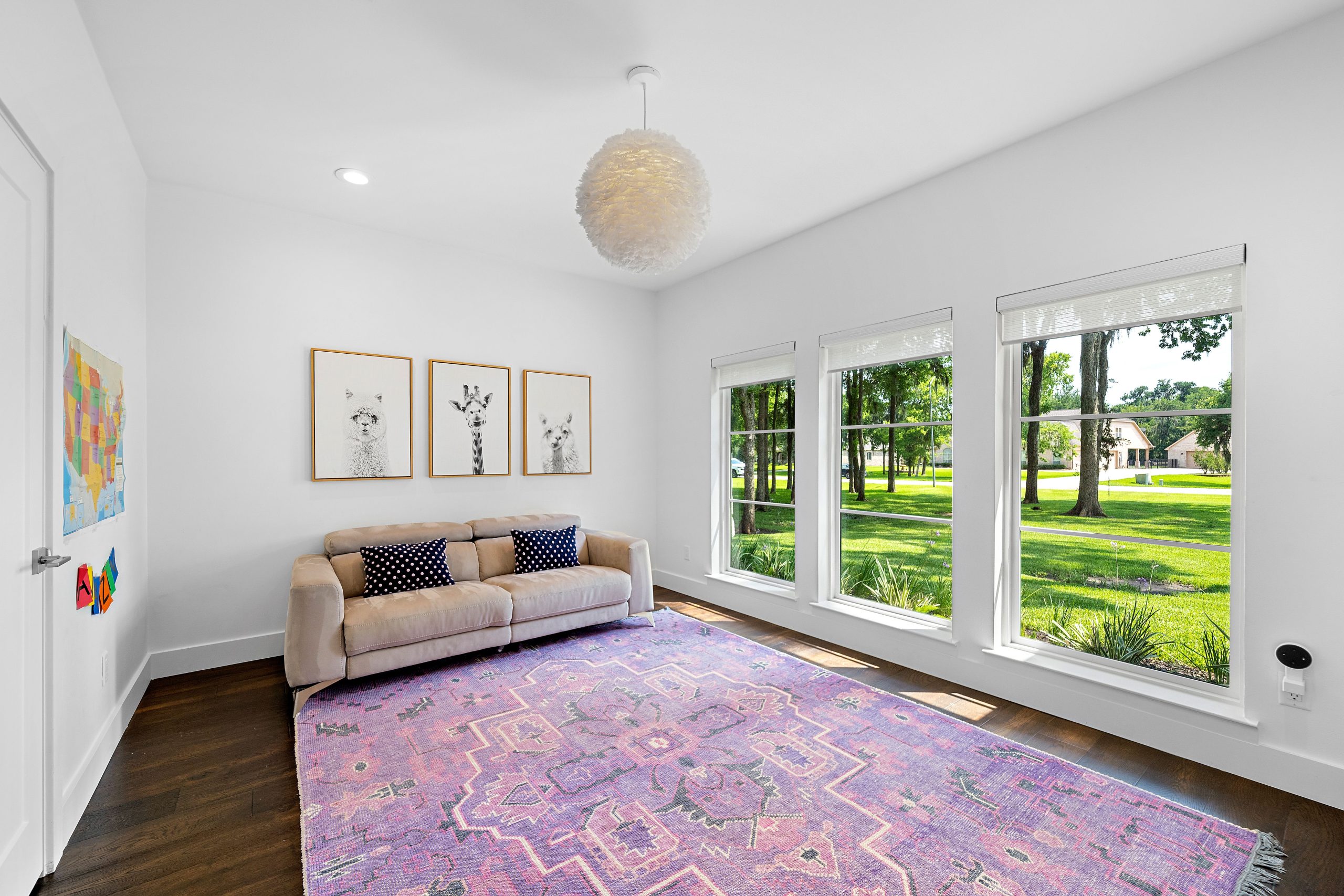 Types of Energy-Efficient Windows & Doors for Your Home Interior view of a minimalist living room with picture windows brightening the space.