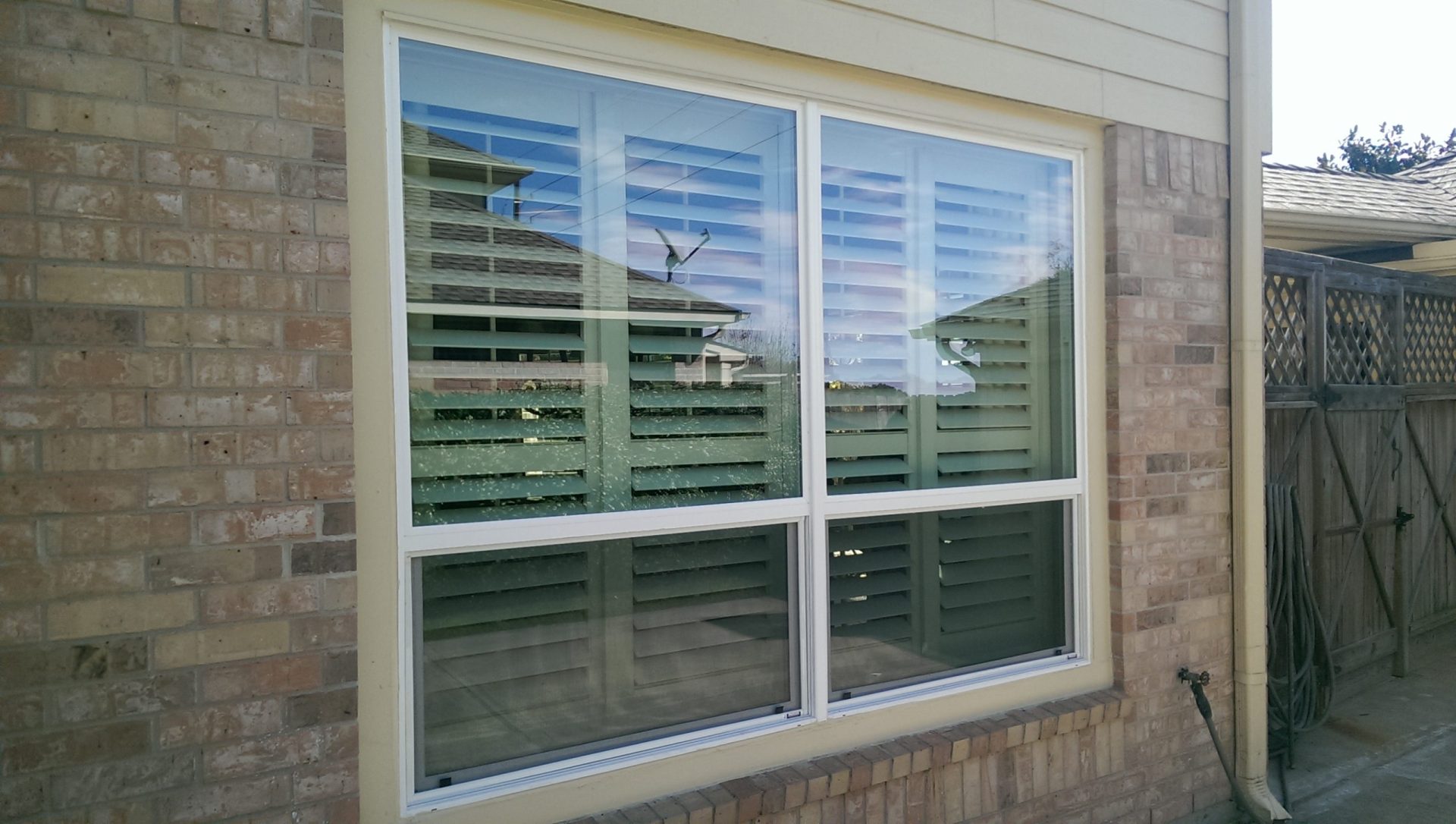 Vinyl Windows Replacement Cost: Key Factors to Consider V25 twin vinyl window installation on brick home