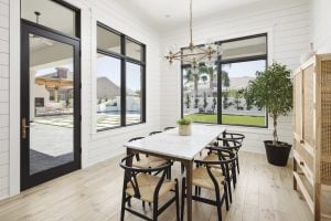 bright dining area in modern home with casement windows