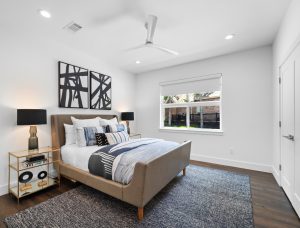 Double hung windows in minimalist bedroom